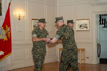 Sgt. Maj. Brandon Link received the Sword of Office from Brig. Gen. Dustin Byrum, Marine Corps Warfighting Laboratory commanding general.