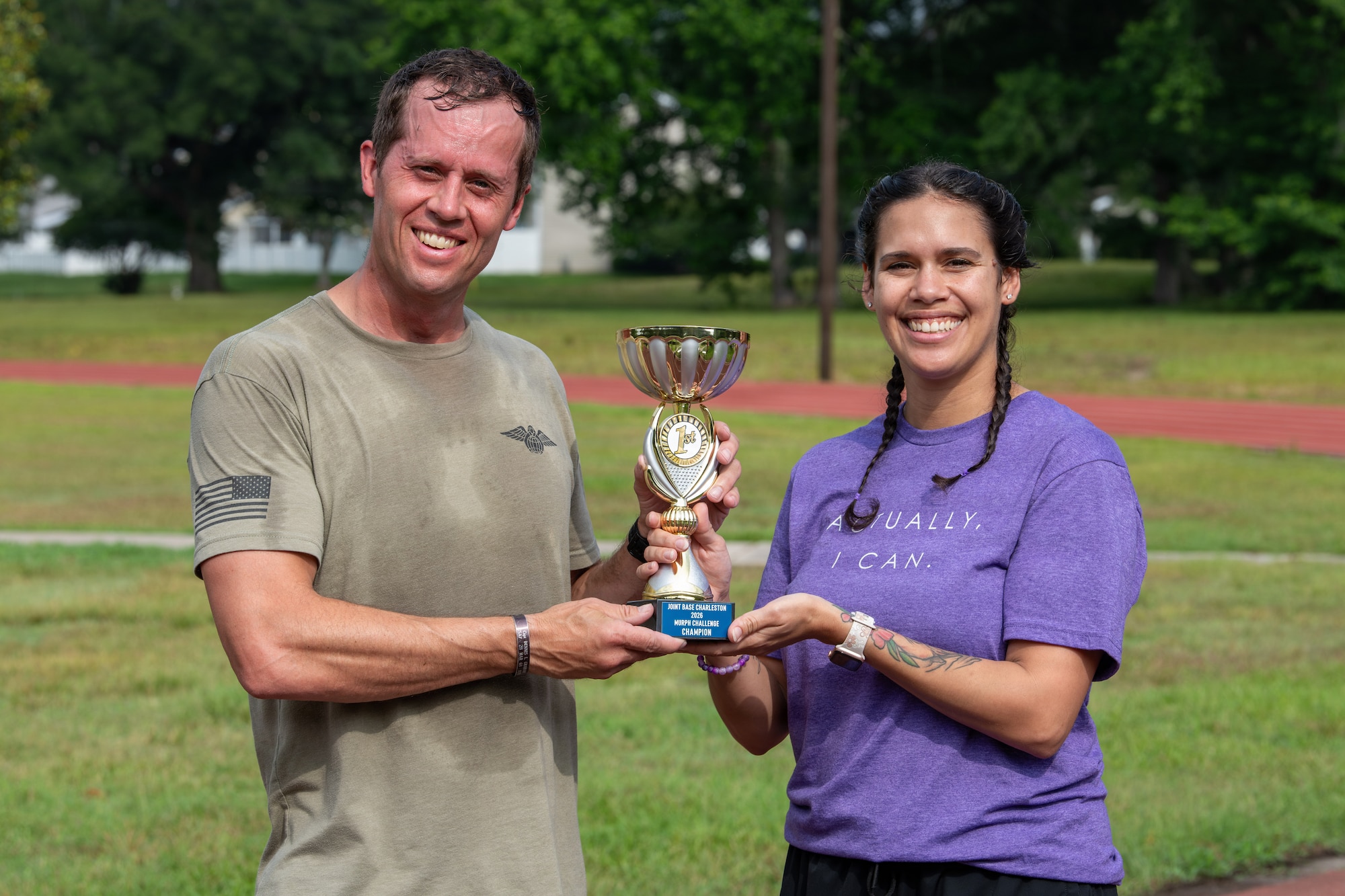 U.S. Airmen pose with a trophy after the Murph Challenge