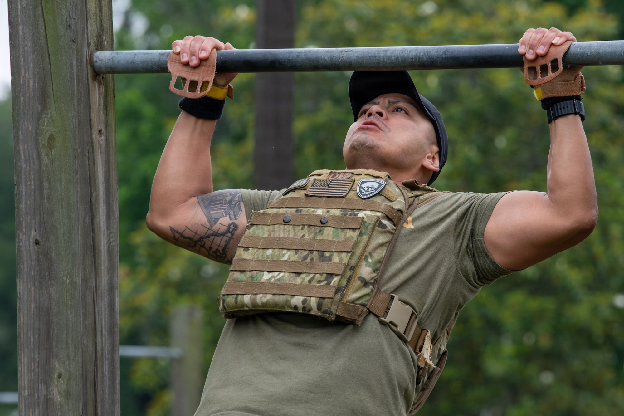 Airman performs a pull-up.
