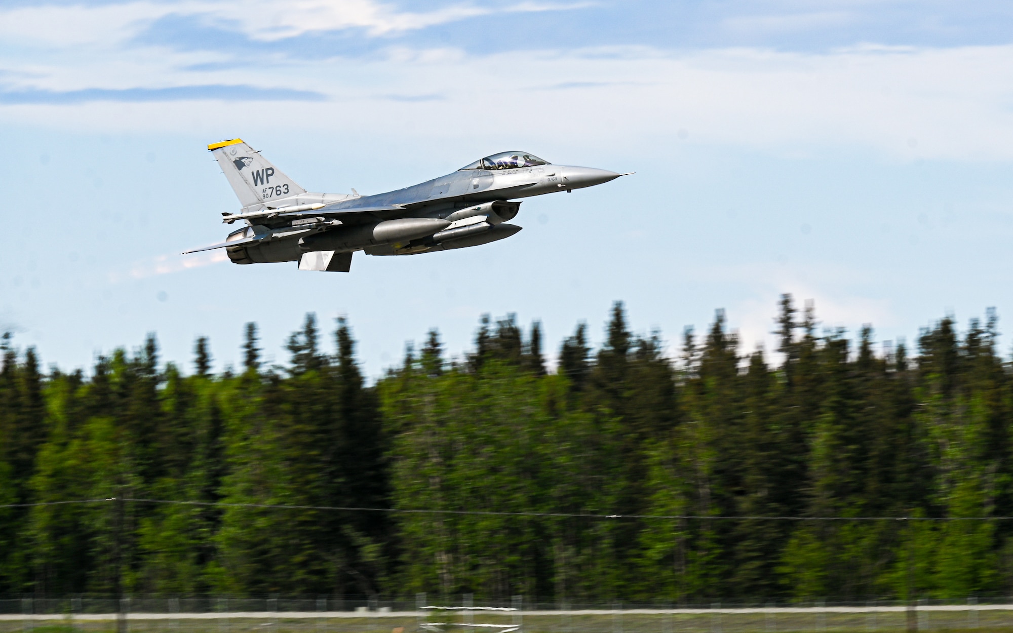 A U.S. Air Force F-16 Fighting Falcon, assigned to the 51st Fighter Wing from Osan Air Base, Republic of Korea, departs the flightline at Eielson Air Force Base, Alaska, June 1, 2026.