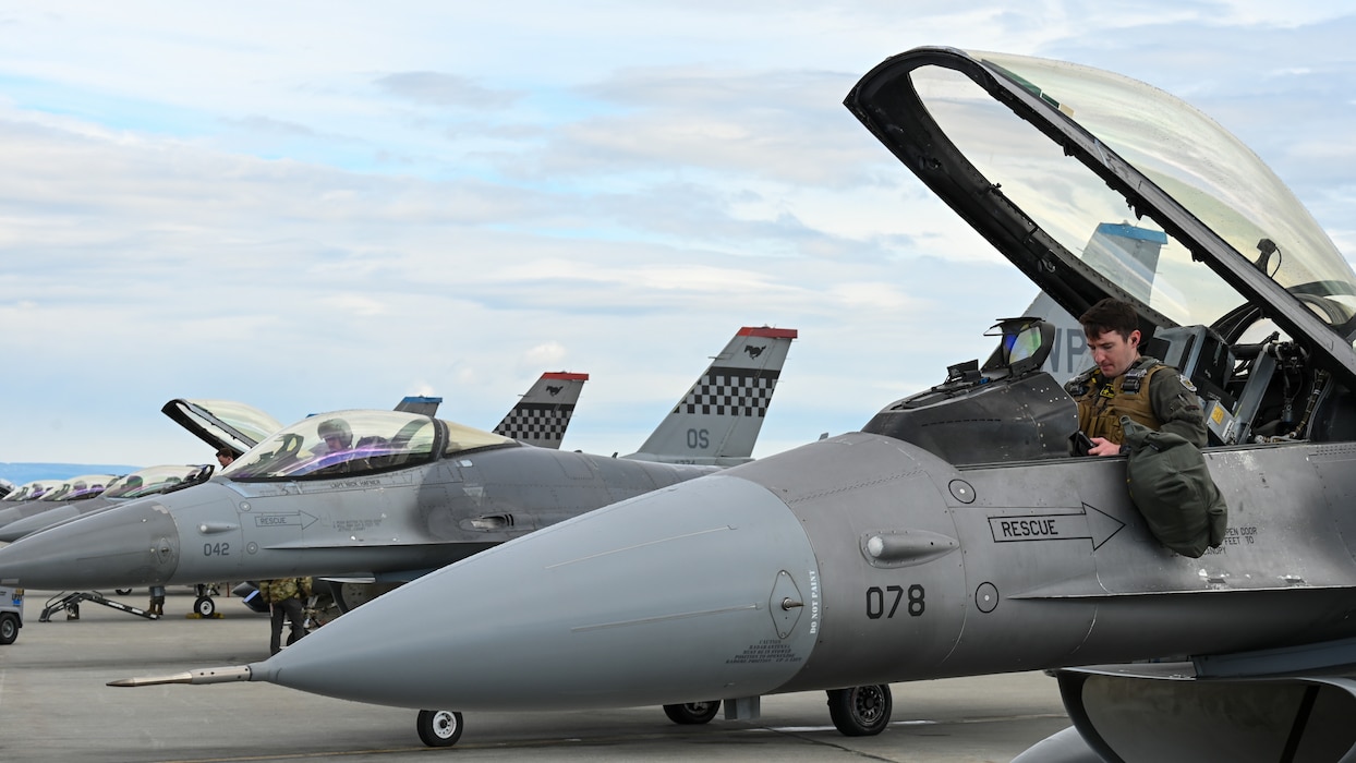 U.S. Air Force F-16 Fighting Falcon pilots assigned to the 51st Fighter Wing from Osan Air Base, Republic of Korea, prepare for a training sortie on the flightline at Eielson Air Force Base, Alaska, June 1, 2026.