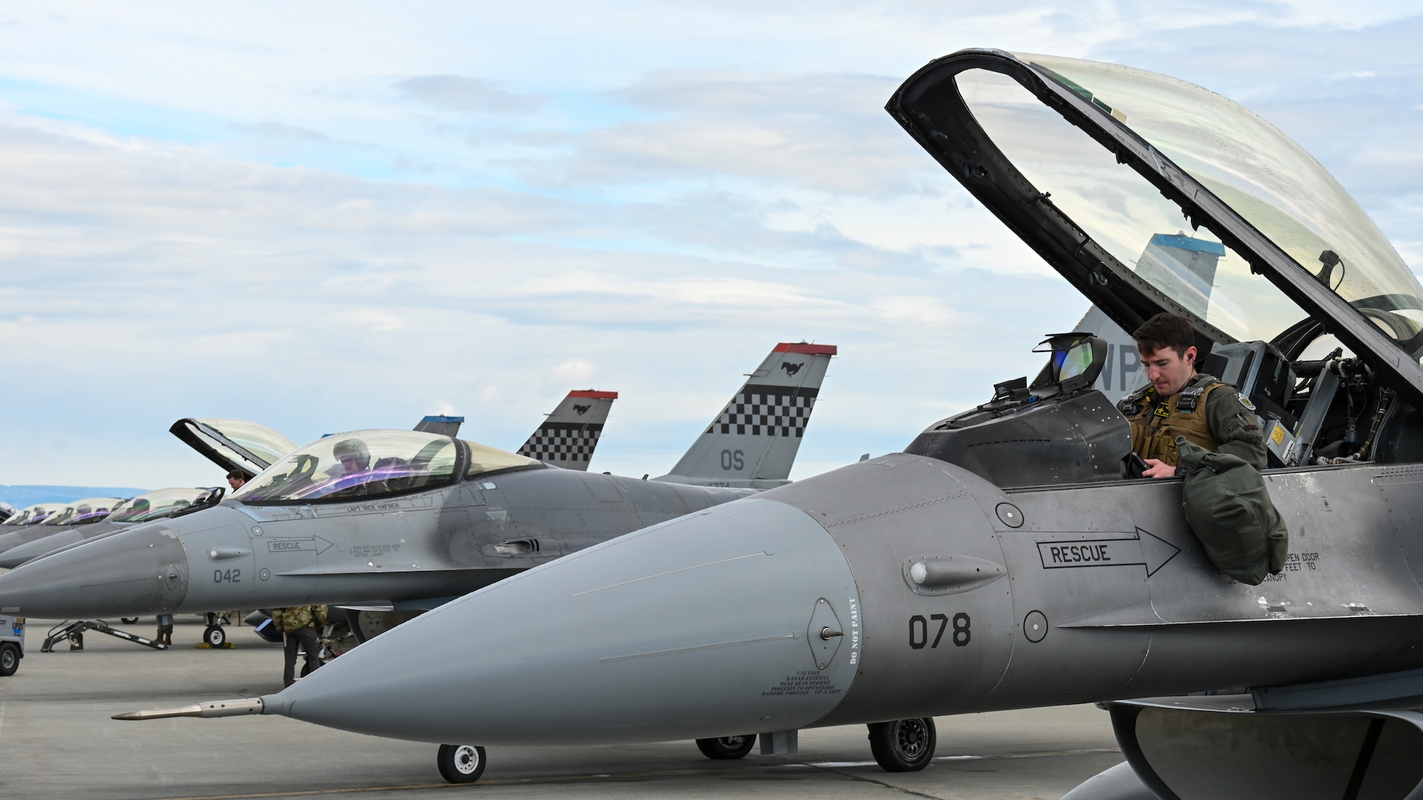 U.S. Air Force F-16 Fighting Falcon pilots assigned to the 51st Fighter Wing from Osan Air Base, Republic of Korea, prepare for a training sortie on the flightline at Eielson Air Force Base, Alaska, June 1, 2026.