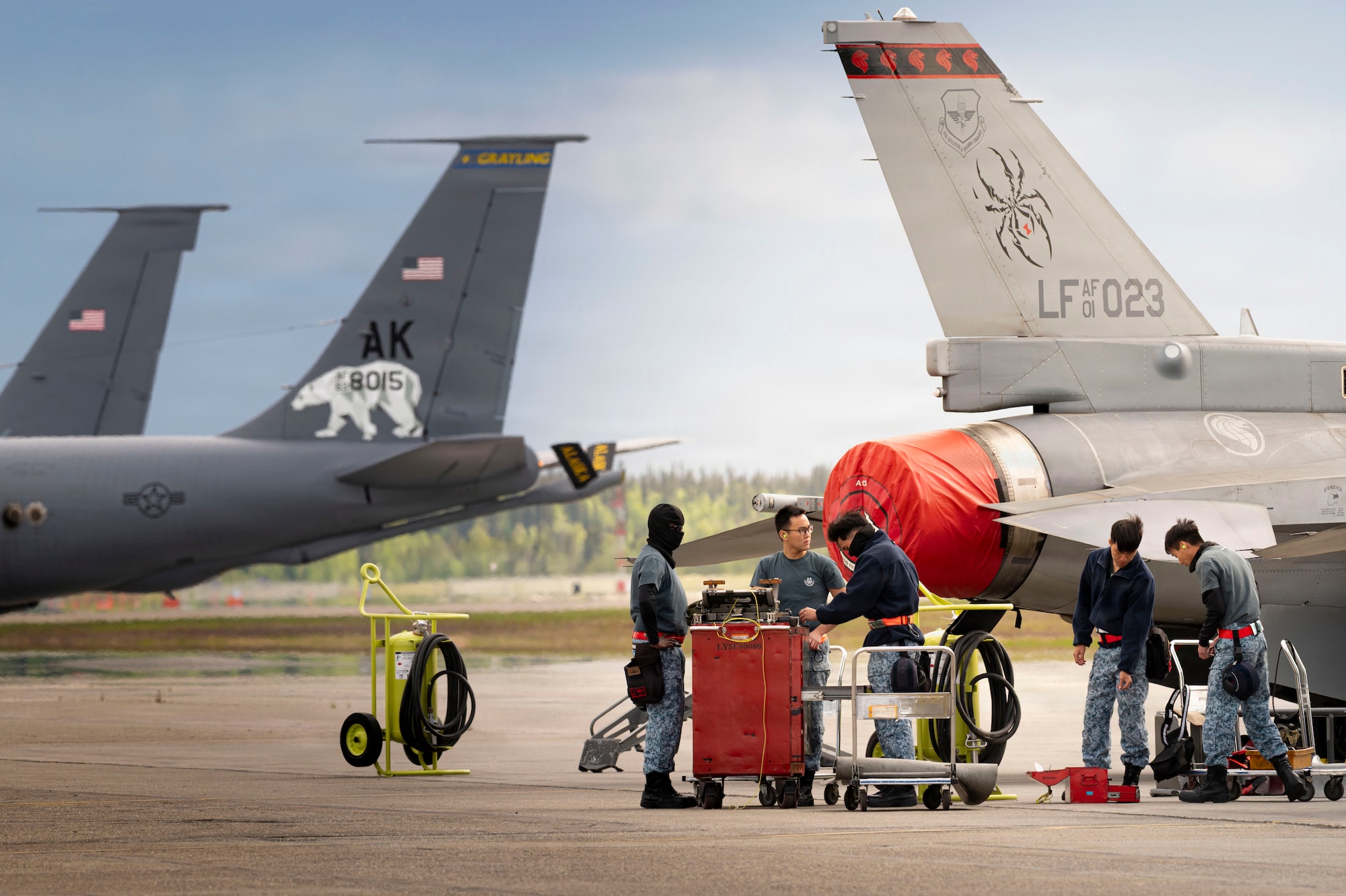 Republic of Singapore Air Force (RSAF) personnel conduct maintenance on an F-16 Fighting Falcon during Red Flag-Alaska 26-2 at Eielson Air Force Base, Alaska, May 28, 2026.