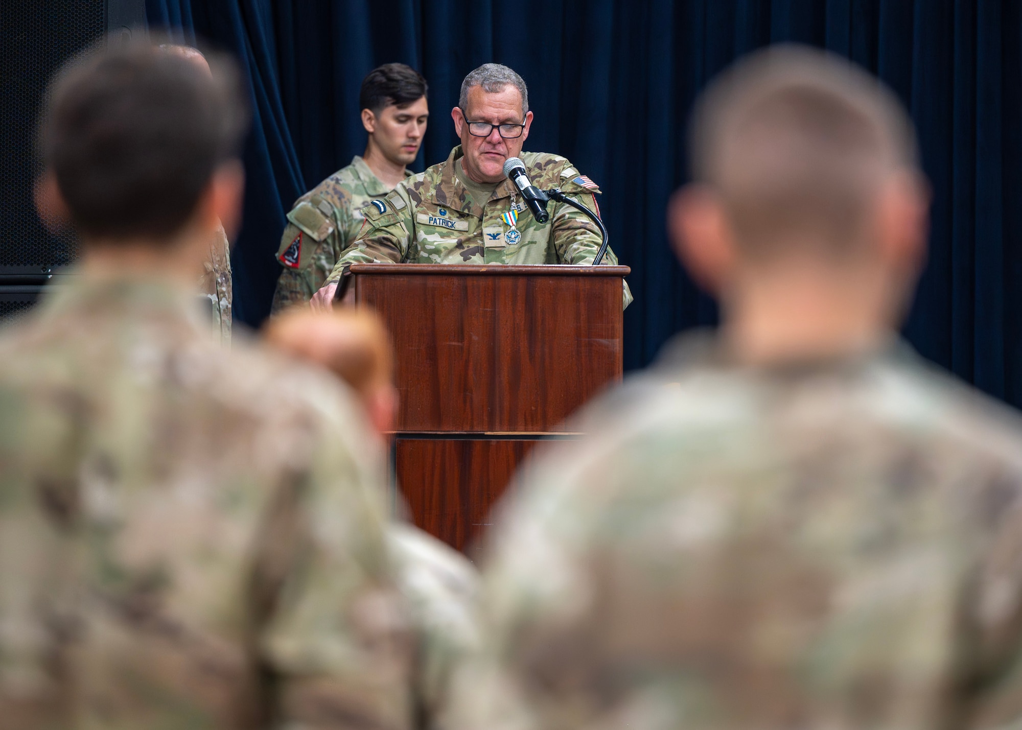 U.S. Space Force Col. John Patrick, outgoing U.S. Space Forces - Korea commander, delivers farewell remarks during a change of command ceremony at Osan Air Base, Republic of Korea, June 2, 2026. USSF-K serves as the U.S. Space Force component to U.S. Forces Korea, providing space expertise, planning, and operational support that strengthens deterrence, enhances combined readiness and supports peace and stability on the Korean Peninsula. (U.S. Air Force photo by Staff Sgt. Sarah Williams)