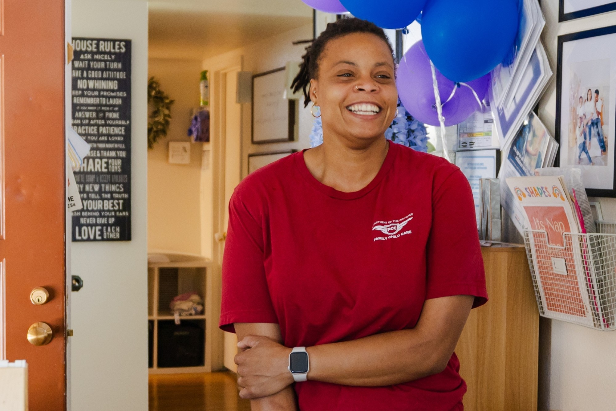 Col. Chris Carnduff, 412th Mission Support Group commander, surprises Matrina McCullough, a Family Child Care provider, at her home to present her with the 2025 Edwards FCC Provider of the Year award at Edwards Air Force Base, California, May 29.