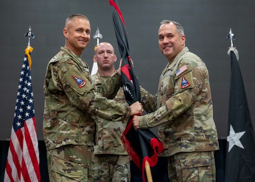 U.S. Space Force Col. Dorian Hatcher, right, incoming U.S. Space Forces - Korea commander, accepts command of USSF-K from U.S. Space Force Brig. Gen. Brian Denaro, left, U.S. Space Forces Indo-Pacific commander, during a change of command ceremony at Osan Air Base, Republic of Korea, June 2, 2026. Hatcher’s career began on the Korean Peninsula 29 years ago as an Army private first class, where he developed an appreciation for readiness and the strength of the U.S.-ROK alliance. (U.S. Air Force photo by Staff Sgt. Sarah Williams)