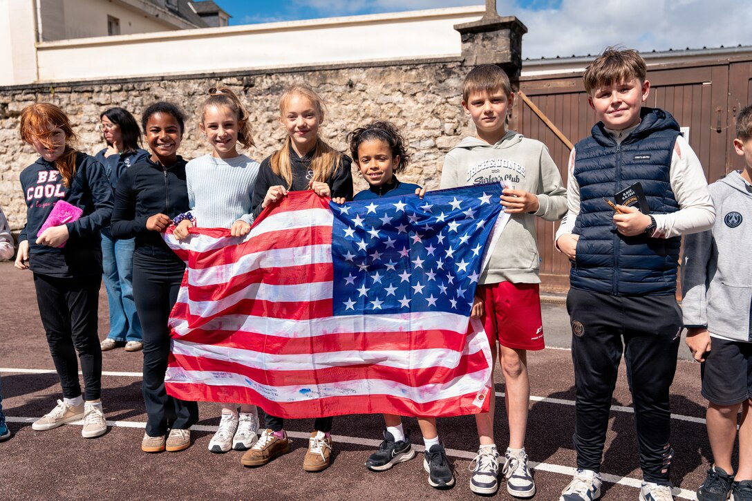 Soldiers assigned to the 101st Airborne Division (Air Assault) visited Notre Dame Primary School in Carentan, France, on June 2, 2026, and met with approximately 60 students as part of an annual outreach effort connecting young people with U.S. service members.

The students, ages 9 and 10 and in fourth and fifth grades, enthusiastically welcomed the Screaming Eagles. 
Sarah Passquier, City of Carentan director of culture and events, said the annual visit helps keep history alive for younger generations.

(U.S. Army photo by Capt. Jennifer French)