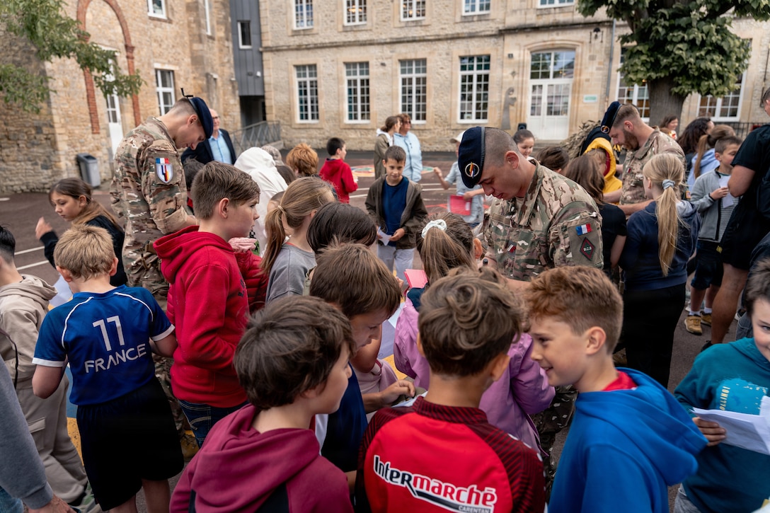 Soldiers assigned to the 101st Airborne Division (Air Assault) visited Notre Dame Primary School in Carentan, France, on June 2, 2026, and met with approximately 60 students as part of an annual outreach effort connecting young people with U.S. service members.

The students, ages 9 and 10 and in fourth and fifth grades, enthusiastically welcomed the Screaming Eagles. 
Sarah Passquier, City of Carentan director of culture and events, said the annual visit helps keep history alive for younger generations.

(U.S. Army photo by Capt. Jennifer French)