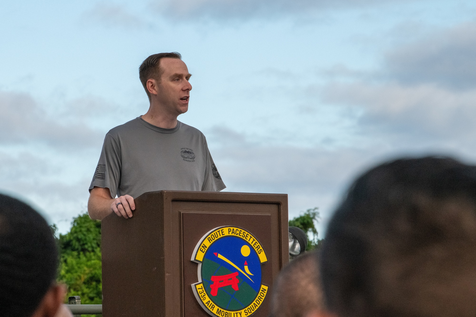 Lt. Col. Joshua Messer, 733rd Air Mobility Squadron commander, speaks during the Port Dawg Memorial Run opening ceremony
