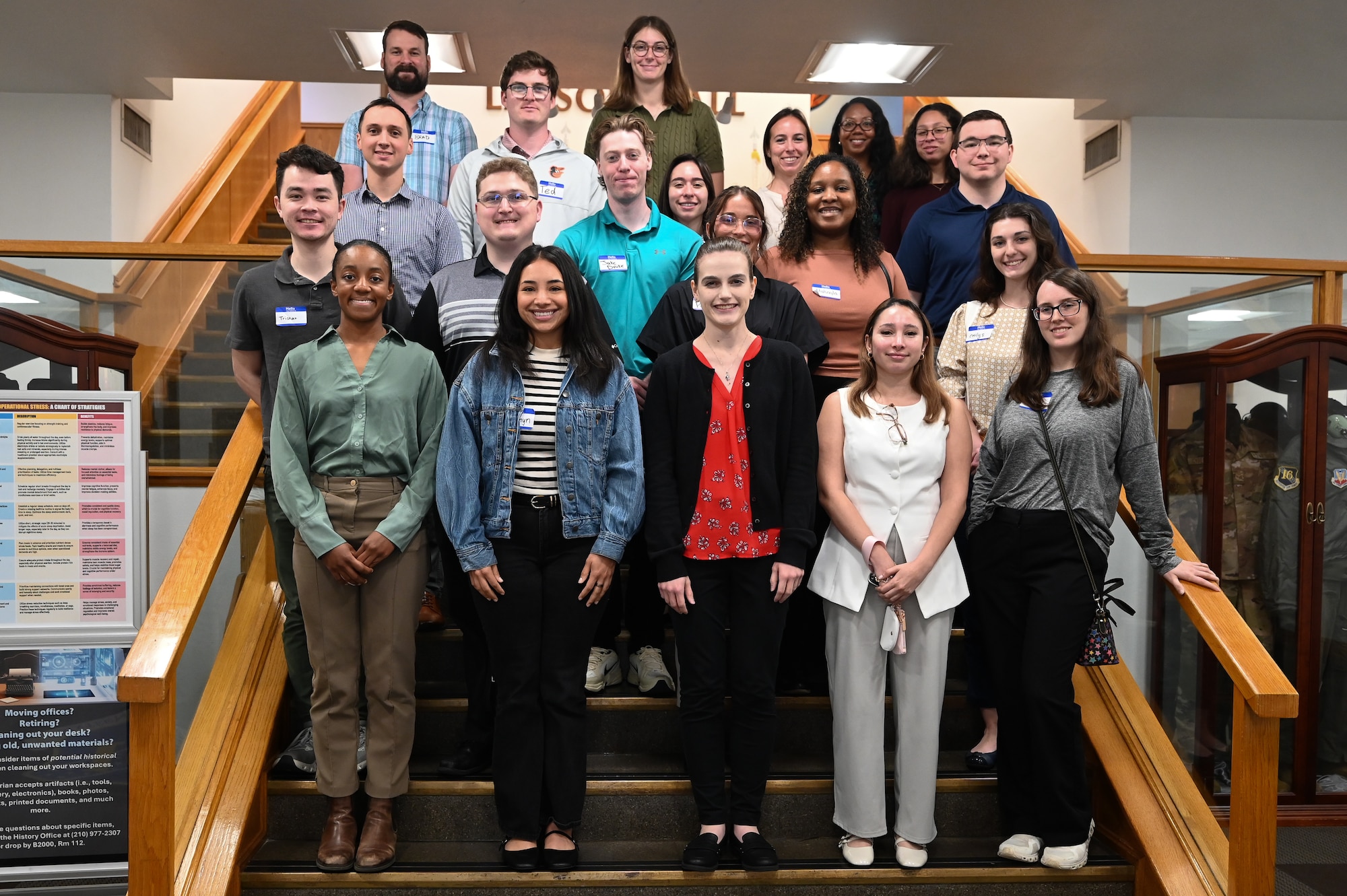 20 PALACE Acquire students stand on a staircase at JBSA Lackland Air Force Cyber HQ