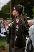 U.S. Army 1st Sgt. Andrae Bermudez, Multipurpose Company, 2nd Battalion, 508th Parachute Infantry Regiment, 2nd Mobile Brigade Combat Team, 82nd Airborne Division, attends a memorial ceremony at the Three Cemeteries Monument, Sainte-Mère-Église, France, June 2, 2026. The Three Cemeteries Monument honors the 14,000 U.S. troops, particularly from the 82nd Airborne Division, who fell during the battle to liberate Normandy, France. (U.S. Army photo by Staff Sgt. Catessa Palone)
