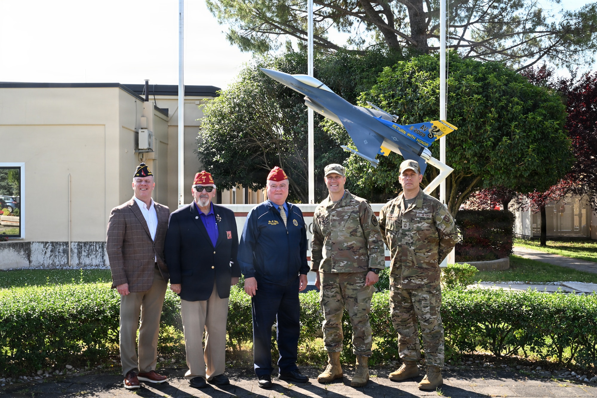 American Legion National Committee pose for a group photo with Aviano Air Base leadership