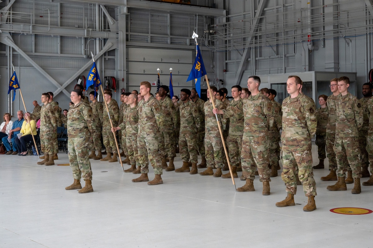 Airmen assigned to the 355th, 356th and 18th Fighter Generation Squadrons stand in formation during the 354th Aircraft Maintenance Squadron reactivation ceremony at Eielson Air Force Base, Alaska, June 1, 2026. The reorganization back to an AMXS aligns with the Air Force’s continued focus on strengthening readiness, streamlining maintenance operations and enhancing combat capability across the wing. (U.S. Air Force photo by Airman First Class Lara Jhane Rabago)