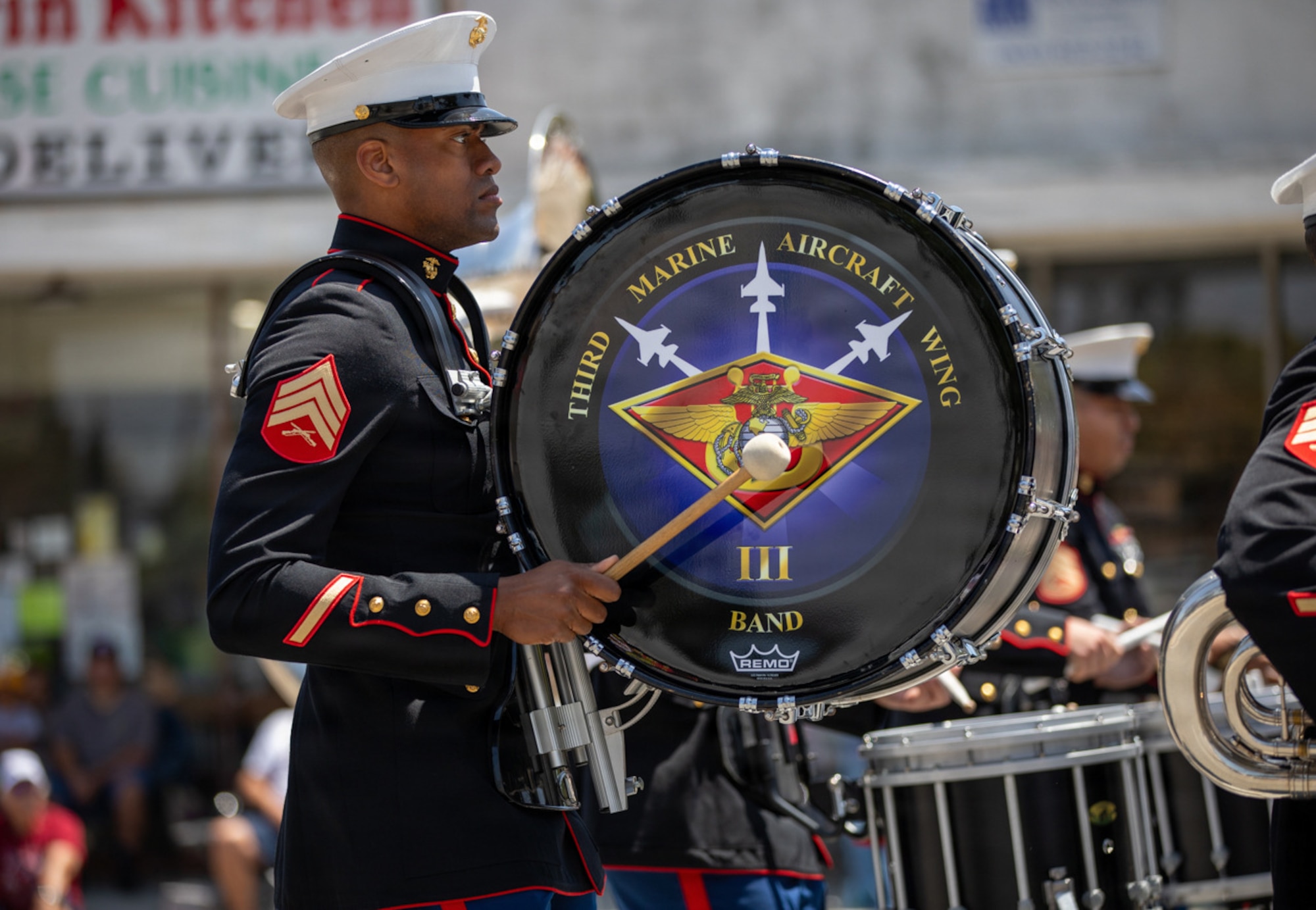 A U.S. Marine with the 3rd Marine Aircraft Wing Band plays the drum during the Torrance Armed Forces Day Parade in Torrance, California, on May 16, 2026. The 3rd Marine Aircraft Wing Band performed musical selections for spectators attending the annual event.
