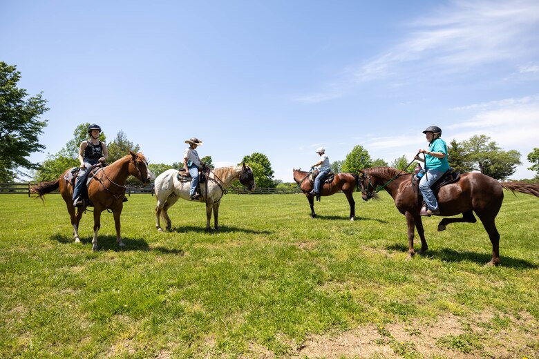 Women on horses.