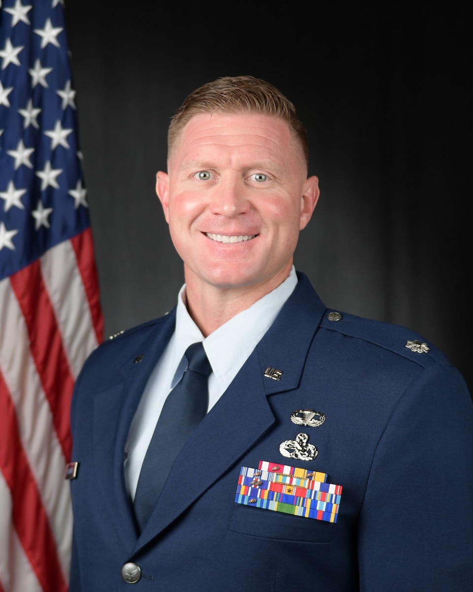 Man posing for a photo in uniform