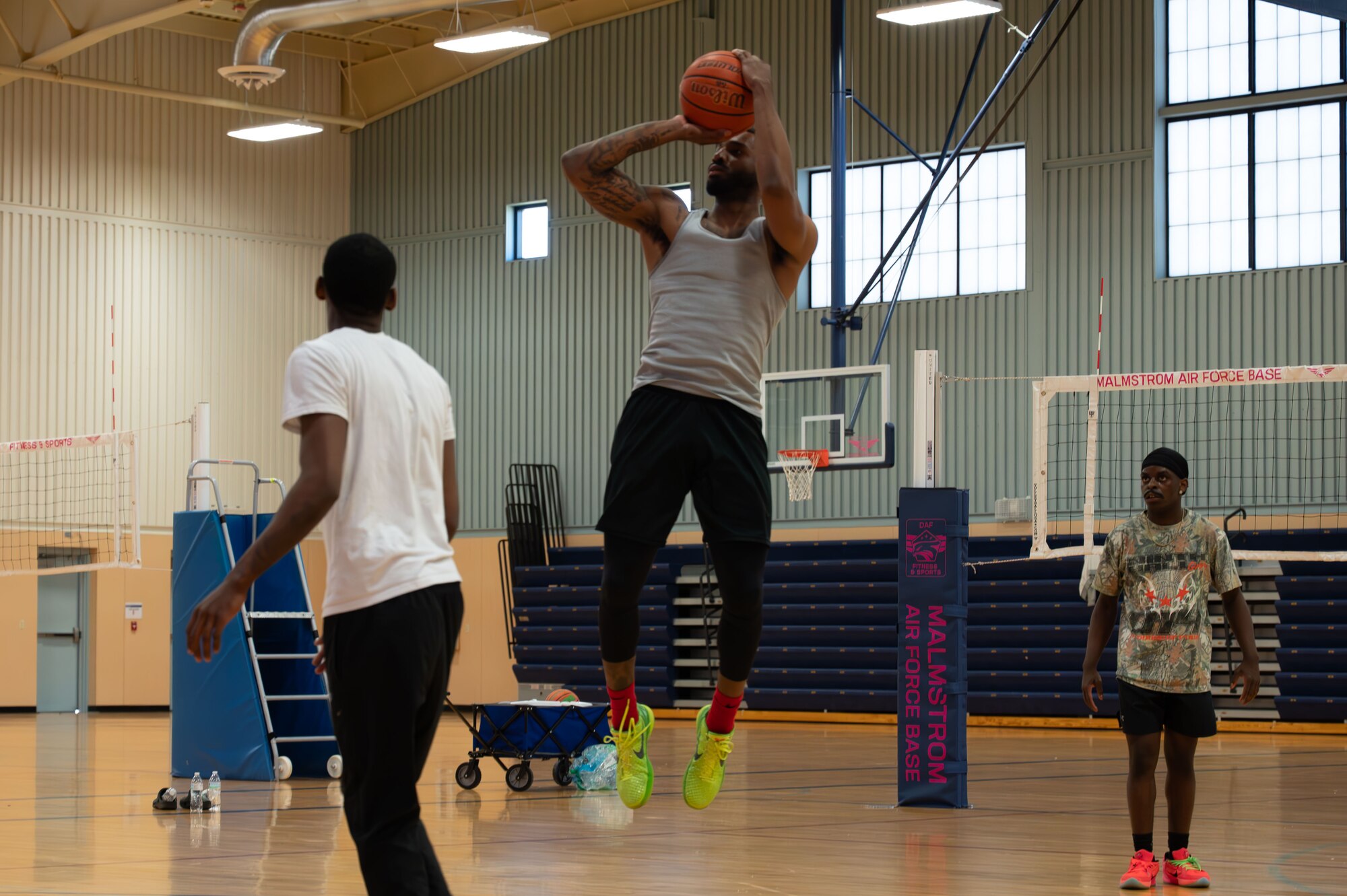 U.S. Air Force Defender making a jump-shot in basketball.