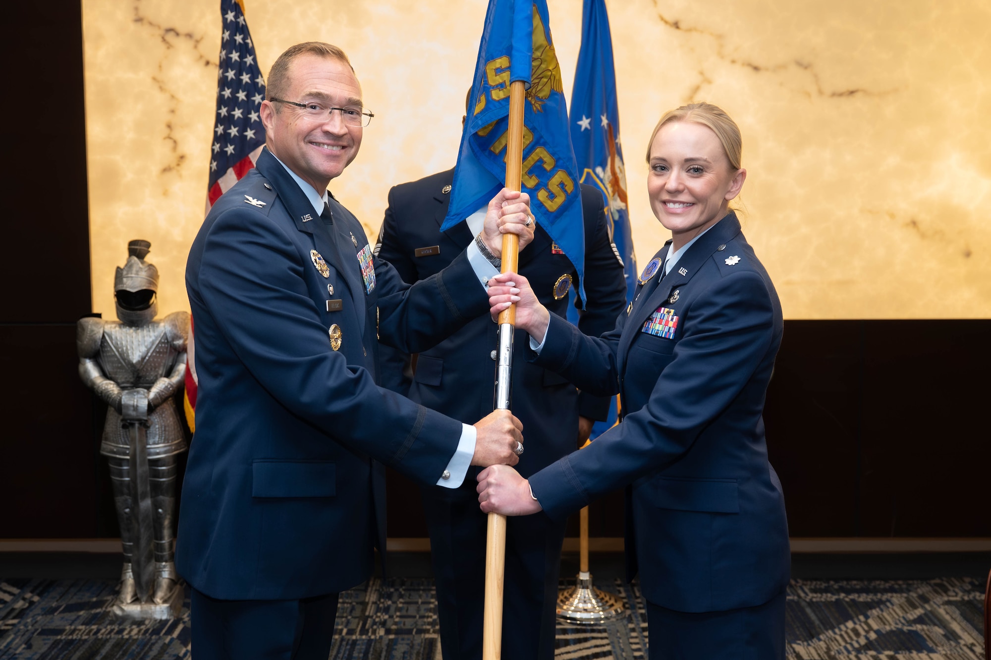 U.S. Air Force Col. Sean Fellows, 376th Recruiting Group commander, Robins Air Force Base, Georgia, passes command to U.S. Air Force Lt. Col. Stephanie L. Bukowski, 350th Recruiting Squadron commander, Joint Base McGuire-Dix-Lakehurst, New Jersey, during the 350 RCS Assumption of Command ceremony, June 2, 2026, Pittsburgh, Pennsylvania. Bukowski now commands 12 flights throughout 21 states in the Northeastern United States, will manage a $675,000 annual budget, the accession of more than 2,000 Citizen Airmen annually in the 350 RCS; comprised of 96 military and 10 civilian personnel, 66 recruiting offices, 14 Military Entrance Processing Stations in an area of operations that spans 588,310 square miles. (U.S. Air Force photo by Master Sgt. Jeffrey Grossi)