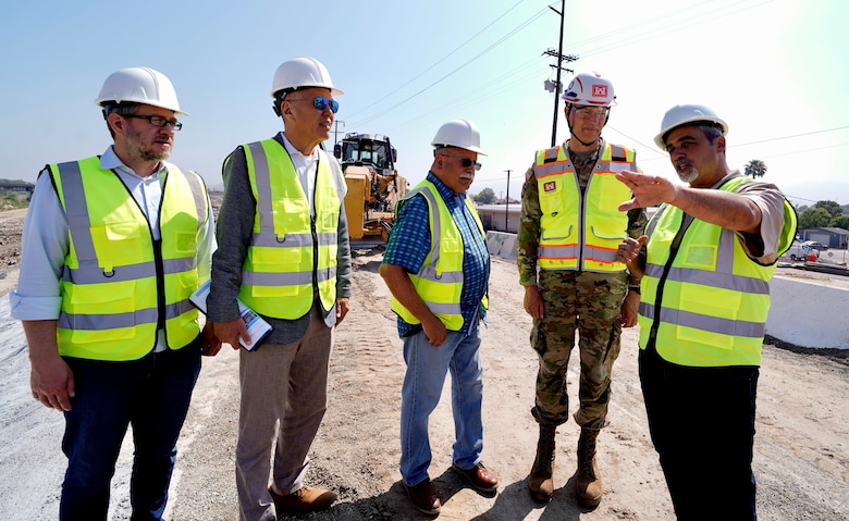 Jason Uhley, Riverside Flood Control and Water Conservation District general manager and chief engineer, far right, joins Col. Andrew Baker, U.S. Army Corps of Engineers Los Angeles District, May 8 to discuss the Riverside Levees Rehabilitation Project with local, county and congressional stakeholders.