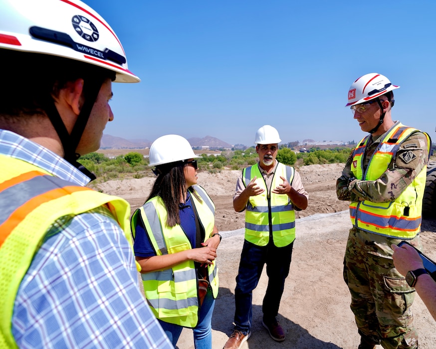 Jason Uhley, Riverside Flood Control and Water Conservation District general manager and chief engineer, second from right, joins Col. Andrew Baker, U.S. Army Corps of Engineers Los Angeles District, right, May 8 to discuss the Riverside Levees Rehabilitation Project with local, county and congressional stakeholders. They are joined by Julianna Adams, chief of emergency management and government affairs for the Riverside Flood Control and Water Conservation District, second from left, and Damien Lariviere, USACE LA District project manager.