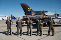 From left to right, U.S. Air Force Brig. Gen. David C. Epperson, U.S. Air Force Warfare Center commander, Brig. Gen. Kristoff R. Smith, USAFWC deputy commander, Brig. Gen. Lawrence T. Sullivan, 57th Wing commander, Col. David T. Madson, USAF Weapons School commandant, and Lt. Col. Anthony R. Norman, 16th Weapons Squadron commander, pose for a group photo.