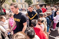 Soldiers assigned to the 101st Airborne Division (Air Assault) visited Notre Dame Primary School in Carentan, France, on June 2, 2026, and met with approximately 60 students as part of an annual outreach effort connecting young people with U.S. service members.

The students, ages 9 and 10 and in fourth and fifth grades, enthusiastically welcomed the Screaming Eagles. 
Sarah Passquier, City of Carentan director of culture and events, said the annual visit helps keep history alive for younger generations.

(U.S. Army photo by Capt. Jennifer French)
