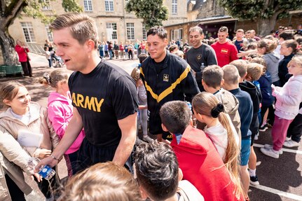 Soldiers assigned to the 101st Airborne Division (Air Assault) visited Notre Dame Primary School in Carentan, France, on June 2, 2026, and met with approximately 60 students as part of an annual outreach effort connecting young people with U.S. service members.

The students, ages 9 and 10 and in fourth and fifth grades, enthusiastically welcomed the Screaming Eagles. 
Sarah Passquier, City of Carentan director of culture and events, said the annual visit helps keep history alive for younger generations.

(U.S. Army photo by Capt. Jennifer French)
