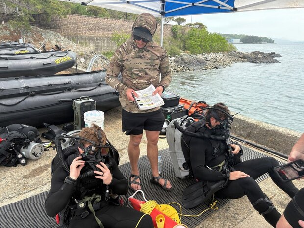 Explosive Ordnance Disposal Mobile Unit FIVE ExMCM Company 3-1 (CTU 77.6) prepare to conduct Mk16 dives alongside Republic of Korea (ROK) divers during the 2026 ROK-U.S. Combined Mine Warfare Exercise in Chinhae, South Korea, April 20, 2026. The 2026 ROK-U.S. Combined Mine Warfare Exercise increases combined proficiency between the Republic of Korea Navy and the U.S. Navy through the exchange of tactics and techniques, while enhancing common bonds. The exercise takes place in U.S. 7th Fleet, the Navy's largest forward-deployed numbered fleet, routinely interacts and operates with allies and partners in preserving a free and open Indo-Pacific. (U.S. Navy photo by Explosive Ordinance Disposal Chief Nicholas Ray)