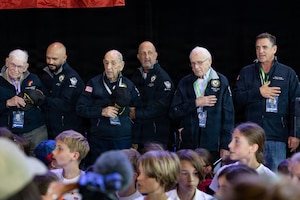 World War II veterans and guests sing the United States national anthem during an arrival event at the Deauville-Normandy Airport in Normandy, France, June 3, 2026. Veterans traveled to Normandy to participate in commemorative events honoring the 82nd anniversary of D-Day. (U.S. Army photo by Sgt. 1st Class Christopher Osburn)