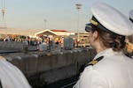 Lt. Yasmeen Keys, assigned to Arleigh Burke-class guided-missile destroyer USS Bulkeley (DDG 84), mans the rails as the ship returns to its homeport of Naval Station (NAVSTA) Rota, Spain, June 1, 2026.