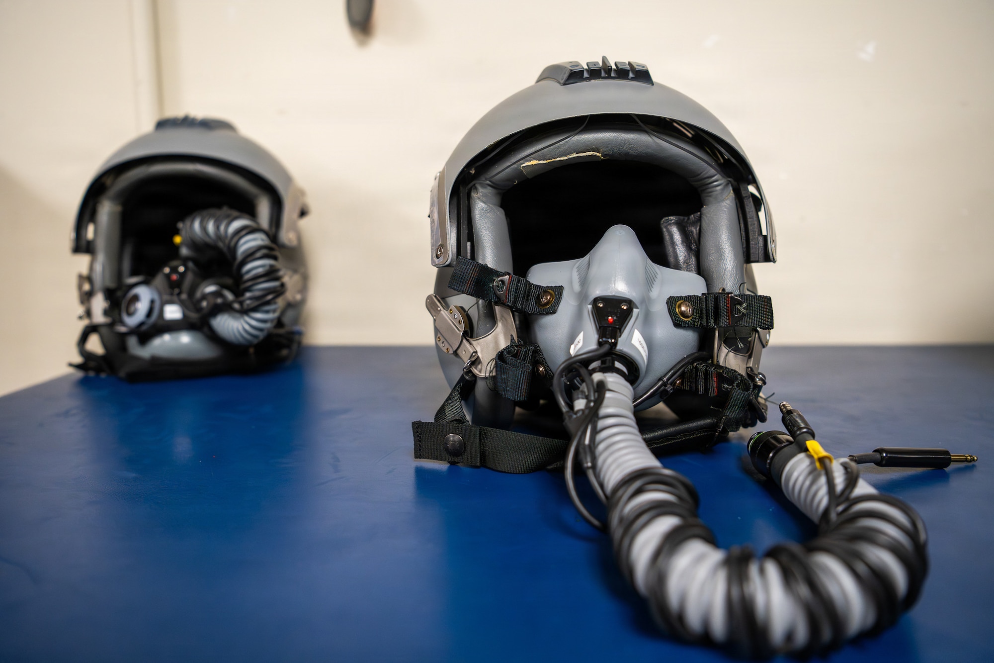 An HGU-55P flight helmet is displayed at MacDill Air Force Base, Florida, May 19, 2026. Aircrew Flight Equipment technicians maintain and inspect equipment to ensure aircrew members remain safe and mission ready. (U.S. Air Force photo by Airman Micquill Davis)