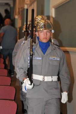 GEORGIA COLLEGE, Milledgeville, Ga., March 25, 2017 - Youth Challenge Academy Color Guard Cadet Kyler Shirley, Fort Stewart YCA, retires the colors during the inaugural graduation of the Milledgeville YCA. The Milledgeville YCA is now the third YCA in the state of Georgia, helping troubled youth become productive citizens in the state and nation.