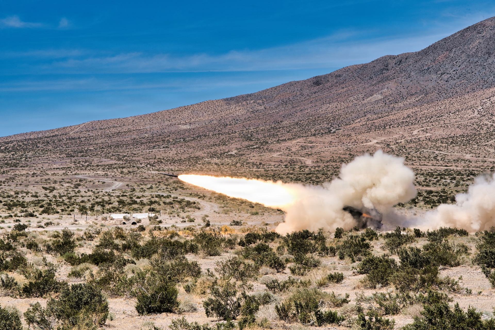 Soldiers of Bravo Battery, 1st Battalion, 623rd Field Artillery conduct live-fire training and Table V certification with a High Mobility Artillery Rocket System (HIMARS) during Exercise Arcane Thunder 26 at Fort Irwin, California, April 24, 2026.