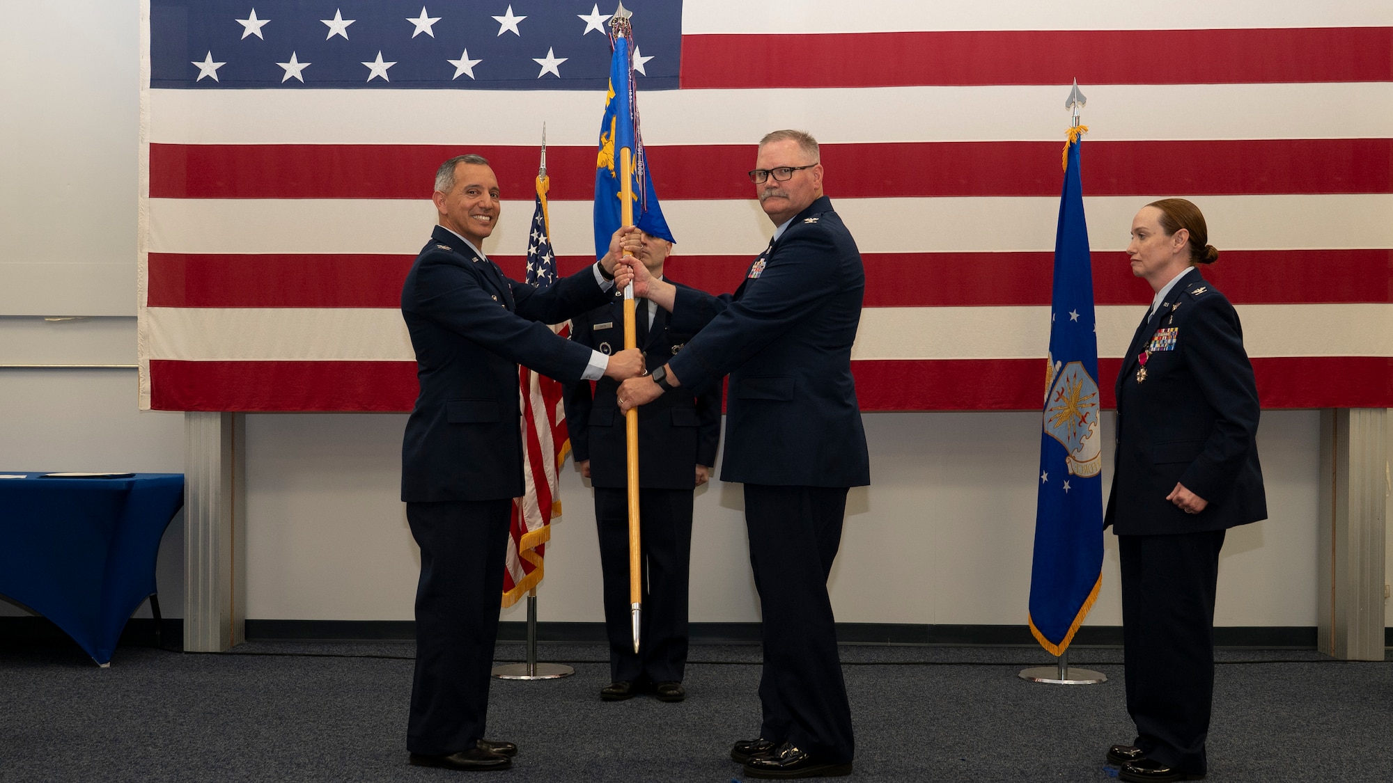 Commander receives guidon.