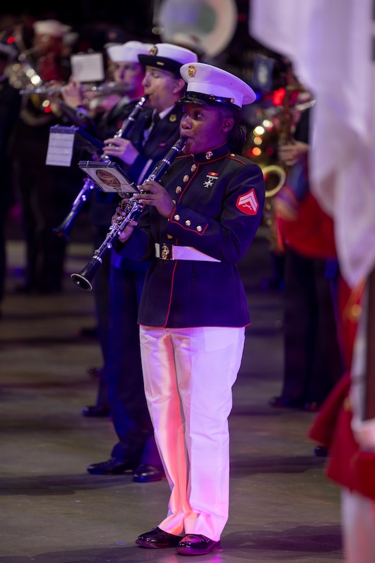 U.S. Marine Corps Cpl. Asemic Valcin, a clarinet instrumentalist with 3rd Marine Aircraft Wing Band, performs for the opening of the Virginia International Tattoo in Norfolk, Virginia, April 17, 2026. The Virginia International Tattoo is an annual event consisting of performances from military bands, drill teams, dancers and singers from around the world. The event celebrated the alliances between the U.S., the U.K., Canada, France, and South Korea. (U.S. Marine Corps photo by Lance Cpl. Zoey Williams)
