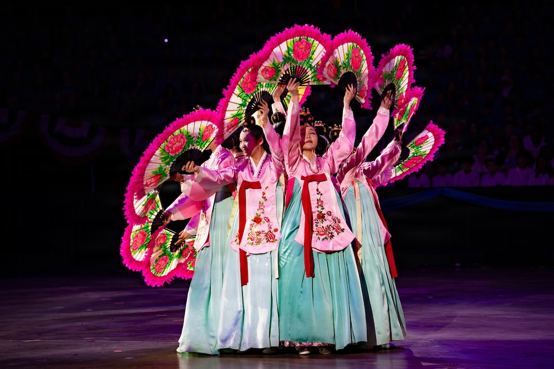 Members of the Lee Keum-yong Sagang Dance Company of Chungnam National University perform during the Virginia International Tattoo at Scope Arena in Norfolk, Virginia, April 17, 2026. The dance company performed in tandem with the Republic of Korea – Army Military Band and Honor Guard. (U.S. Army photos by Sgt. Samantha Cate)