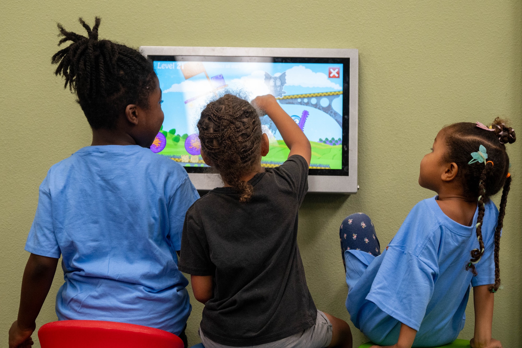 Military children play an educational game during the 56th Force Support Squadron’s Luke Air Force Base Library "Plant a Seed, Read" summer reading program kickoff held at Luke AFB, Arizona, June 3, 2026.
