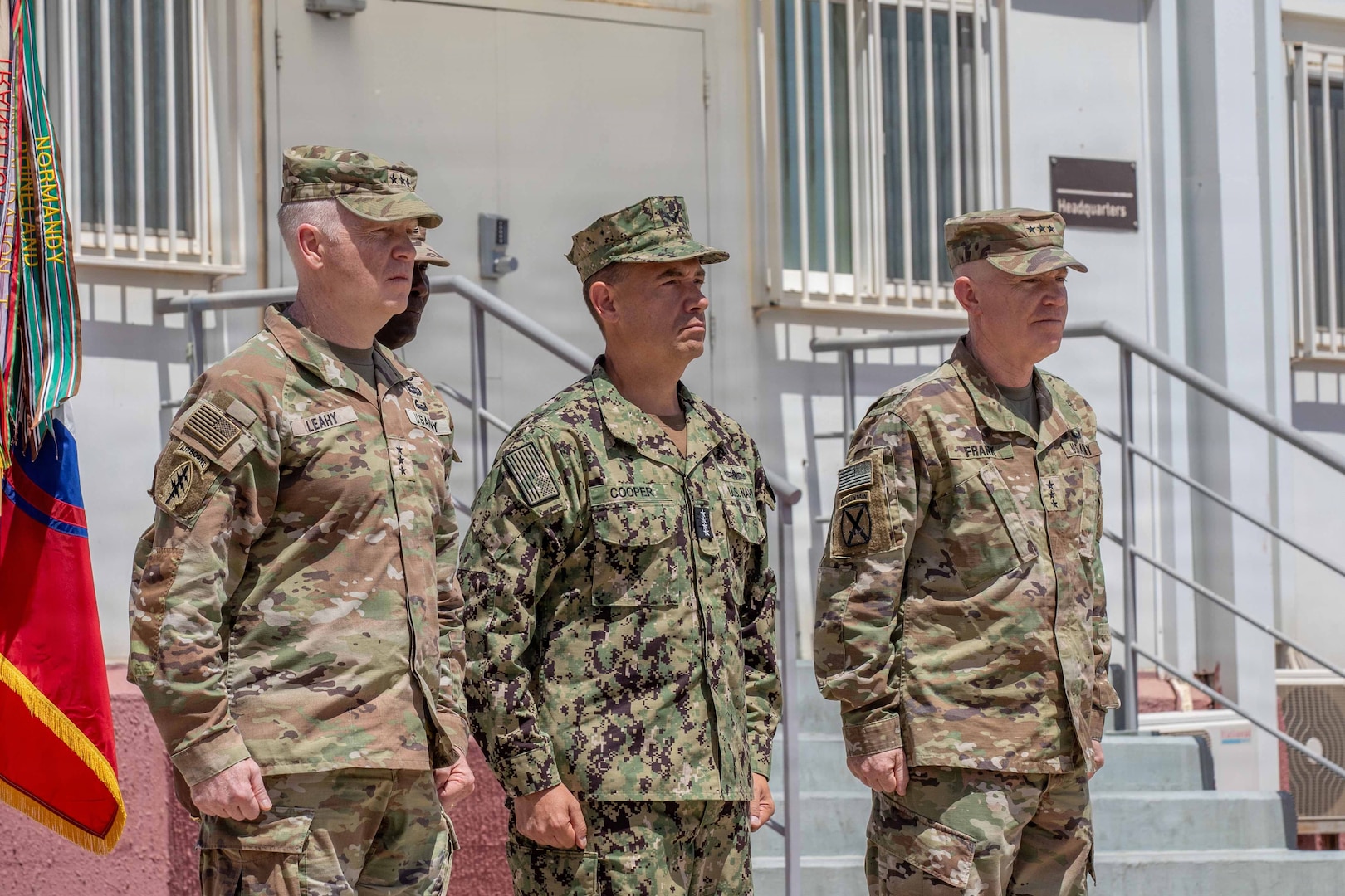 Lt. Gen. Kevin Leahy (left), incoming commander of U.S. Army Central (ARCENT) and Third Army, Adm. Brad Cooper (center), commander of U.S. Central Command, and Lt. Gen. Patrick Frank, outgoing ARCENT commander, prepare to execute the ARCENT change of command ceremony June 4 in the Middle East. (U.S. Army photo)