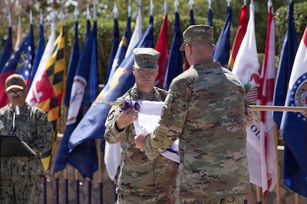 Maj. Gen. Henry S. Dixon, commander, Joint Task Force–North (JTF-N), cases the colors during the JTF-N Casing ceremony at Fort Bliss, Texas, June 3, 2026. The ceremony marks the completion of the organization’s mission in support of NORAD and USNORTHCOM. (U.S. Army photo by Sgt. Treavon Triplett)