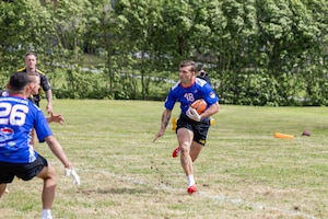 Players from the 101st Airborne Division and the 82nd Airborne Division face off during the Remembrance Bowl in Normandy, France, June 4, 2026. The event serves as a tribute to the sacrifices of Allied forces during the D-Day campaign and highlights the continued esprit de corps of America’s airborne forces. (U.S. Army photo by Sgt. 1st Class Christopher Osburn)