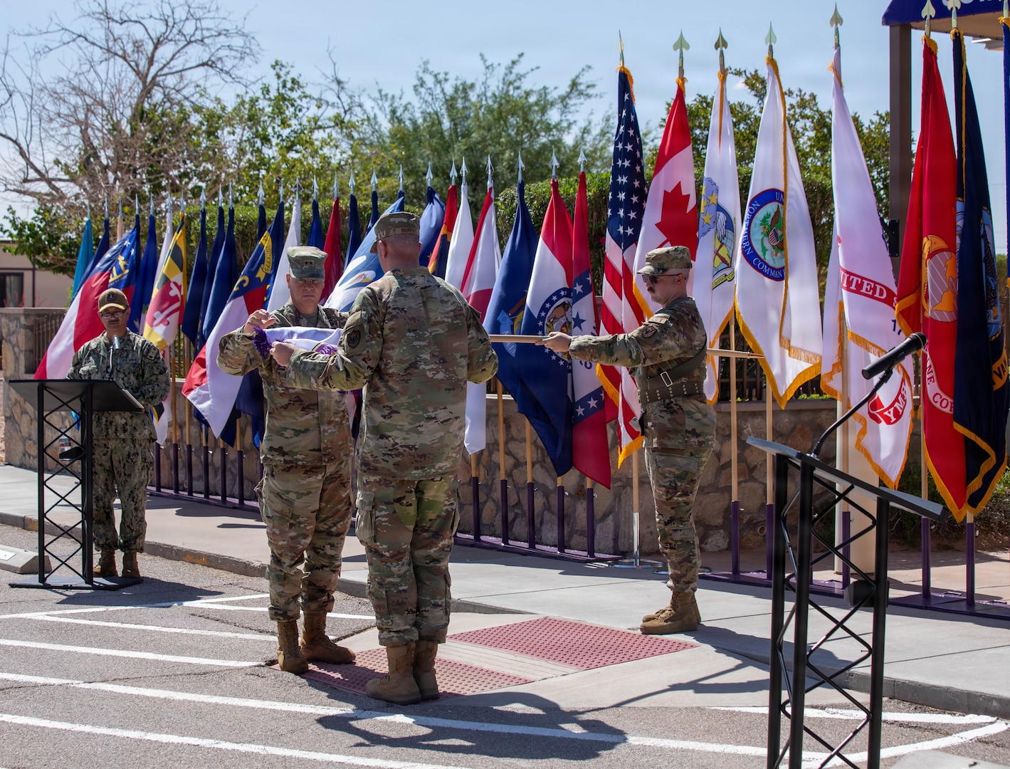 Maj. Gen. Henry S. Dixon, commander, Joint Task Force–North (JTF-N), cases the colors during the JTF-N Casing ceremony at Fort Bliss, Texas, June 3, 2026. The ceremony marks the completion of the organization’s mission in support of NORAD and USNORTHCOM. (U.S. Army photo by Sgt. Treavon Triplett)