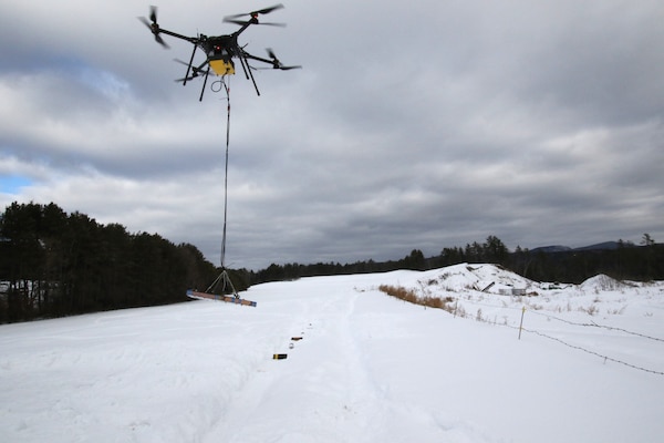 Researchers from the U.S. Army Engineer Research and Development Center’s Cold Regions Research and Engineering Laboratory and Dartmouth College are using drones and electromagnetic induction to find and identify unexploded ordnance.  (U.S. Army Corps of Engineers photo)