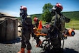 Service members from the New York and New Jersey National Guard Homeland Response Force conduct casualty extraction and hazardous environment response training under the instruction of the West Virginia National Guard during a regional CBRN response exercise. The training focused on lifesaving operations, interagency coordination and rapid response capabilities during large-scale domestic emergencies. (U.S. Army National Guard photo by Sgt. Tristan Murry)