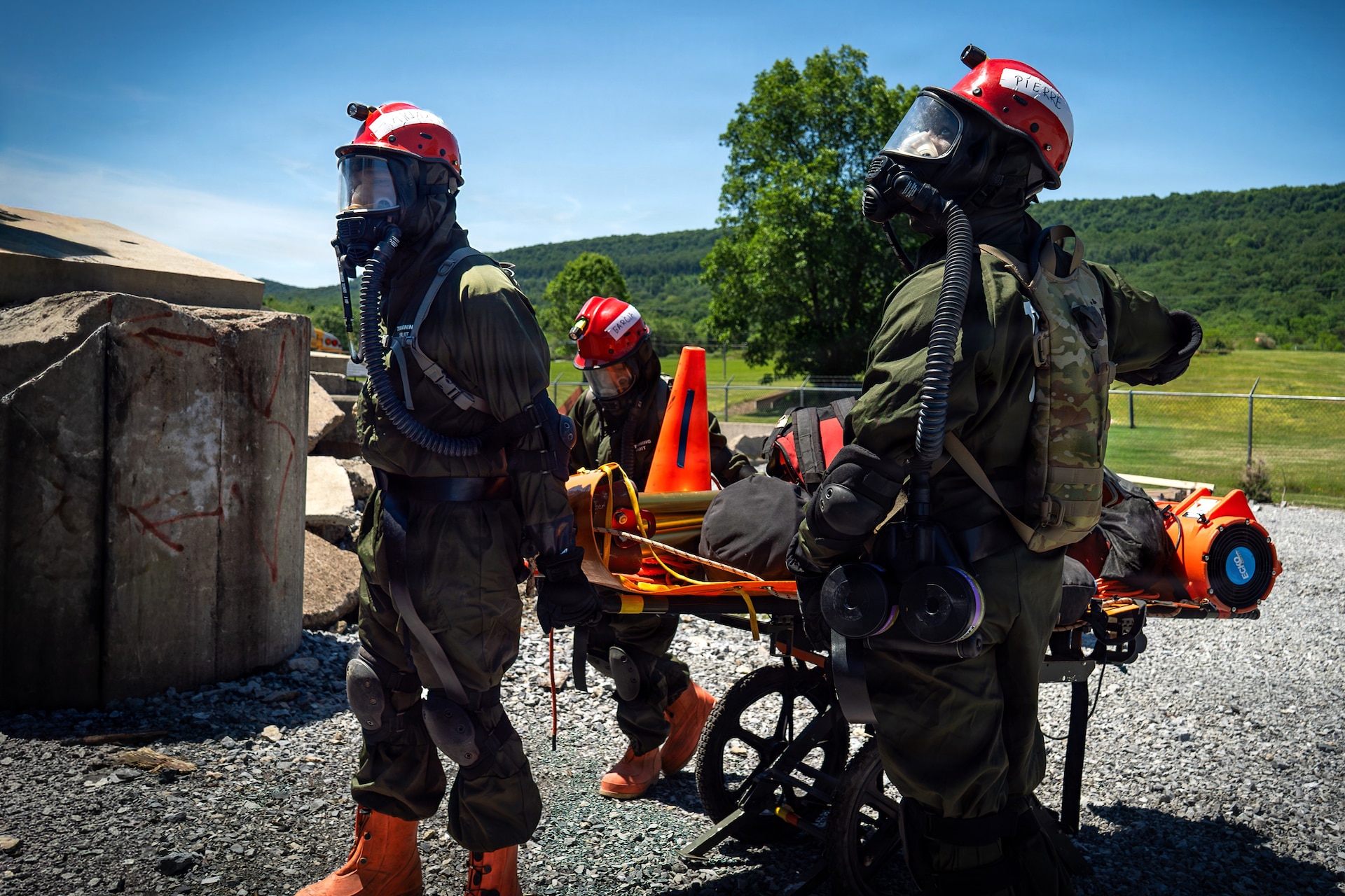 Service members from the New York and New Jersey National Guard Homeland Response Force conduct casualty extraction and hazardous environment response training under the instruction of the West Virginia National Guard during a regional CBRN response exercise. The training focused on lifesaving operations, interagency coordination and rapid response capabilities during large-scale domestic emergencies. (U.S. Army National Guard photo by Sgt. Tristan Murry)