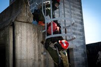 Service members from the New York and New Jersey National Guard Homeland Response Force conduct casualty extraction and hazardous environment response training under the instruction of the West Virginia National Guard during a regional CBRN response exercise. The training focused on lifesaving operations, interagency coordination and rapid response capabilities during large-scale domestic emergencies. (U.S. Army National Guard photo by Sgt. Tristan Murry)
