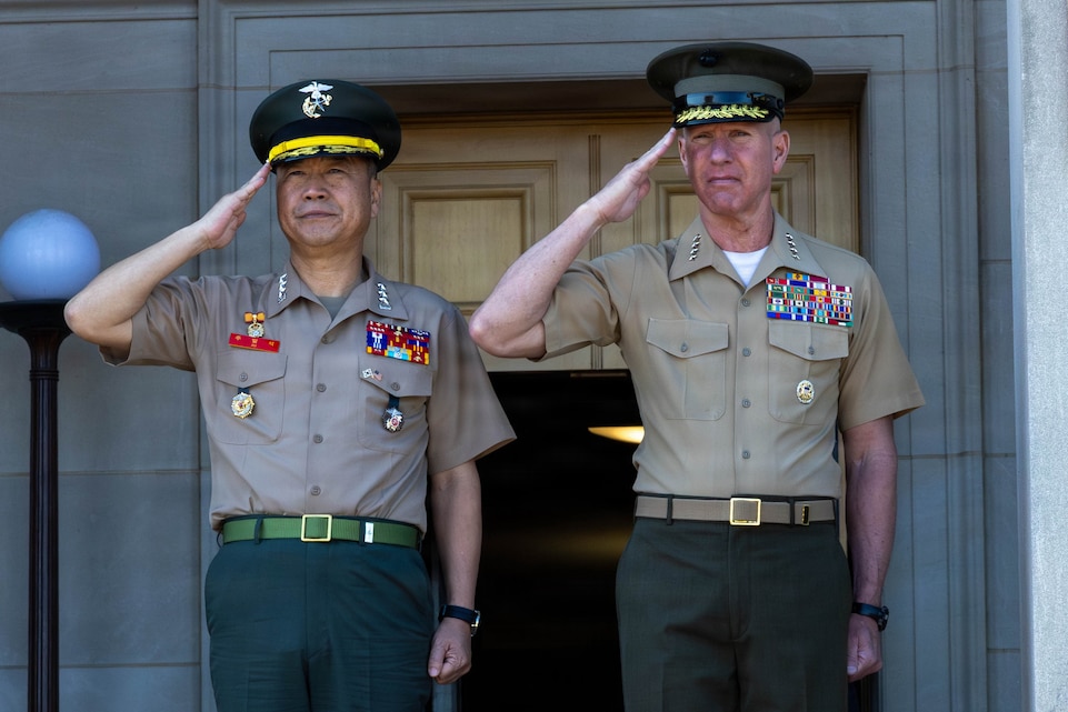 The 39th Commandant of the Marine Corps, Gen. Eric M. Smith, and the Commandant of the  Republic of Korea Marine Corps, Lt. Gen Ju II-Seok, stand for colors during an honors cordon at Arlington, Virginia, June 2, 2026.