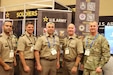 HONOLULU, Hawaii — Leaders from the 402nd Army Field Support Brigade pose for a photo at the Association of the United States Army's Land Forces Pacific Symposium and Exposition (LANPAC) 2026 in Honolulu, Hawaii.