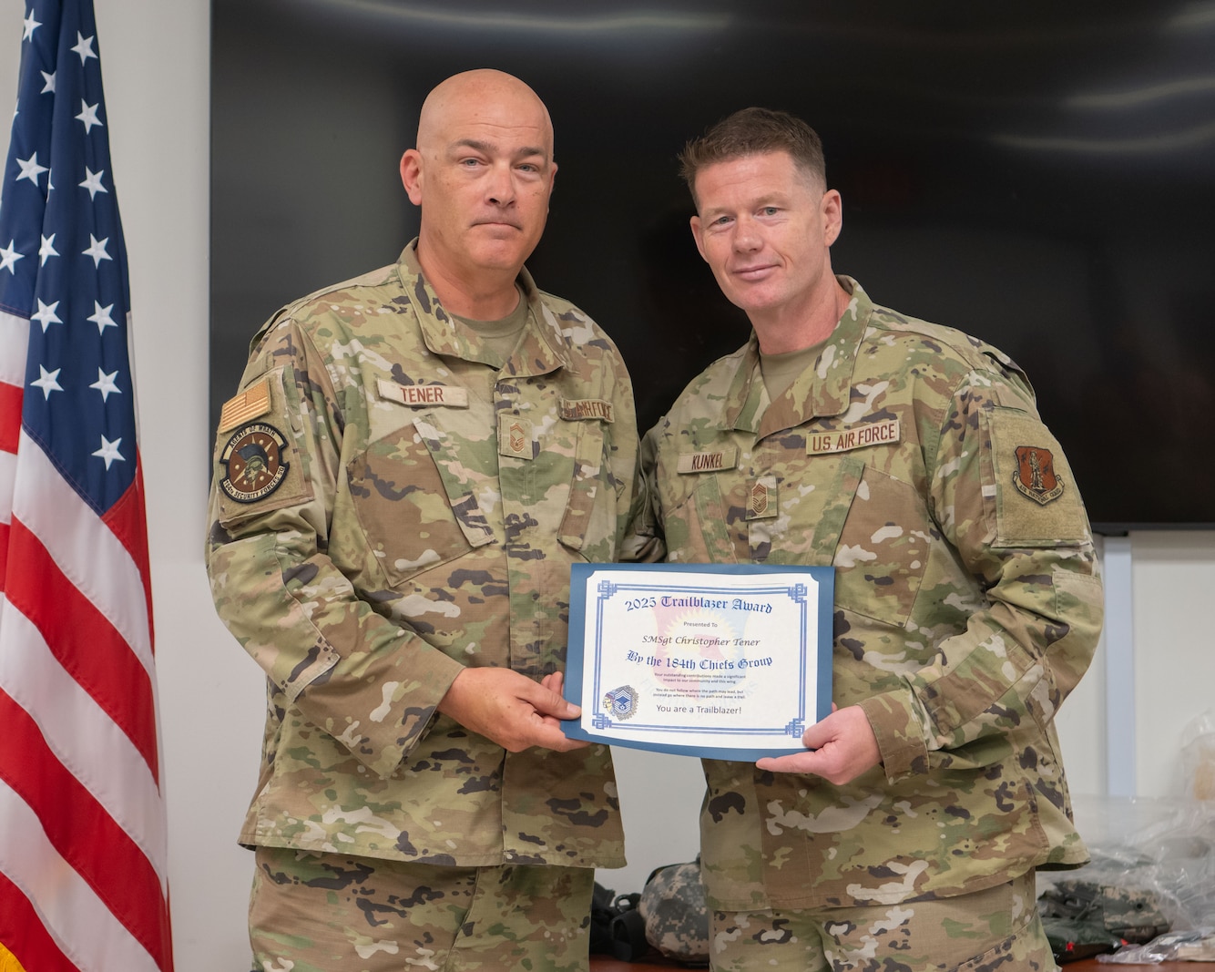 Congratulations to Senior Master Sgt. Christopher Tener (left), 184th Security Forces Squadron, on his nomination for the 184th Wing Chief’s Group "Trailblazer" Award. 

Tener consistently exemplifies the highest standards of leadership, innovation, and service. Serving as the squadron’s support superintendent, wing anti-terrorism program manager, and resource advisor, his operational impact on the installation is profound.