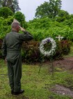 Adm. Samuel J. Paparo, commander of U.S. Indo-Pacific Command, salutes a wreath at a memorial site in Peleliu, Republic of Palau, May 26, 2026.