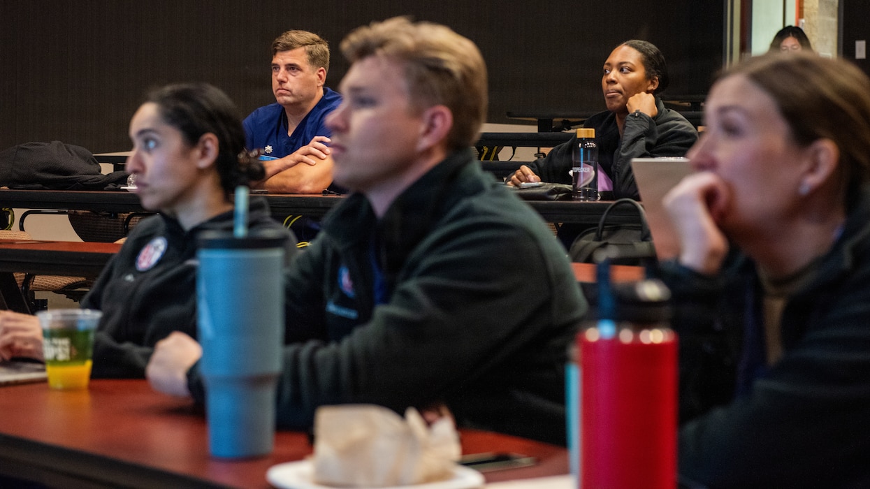 Airmen participate in classroom lectures